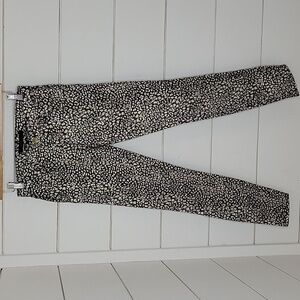 GENETIC size 25 gold and black animal print pants